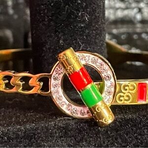 Gold Bracelet with Red and Green Accents